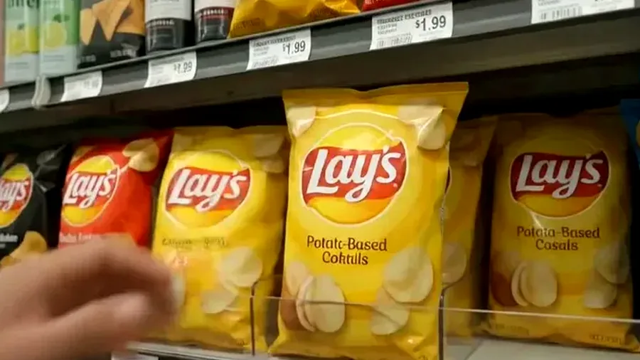 Snack shelves inside Harrison Liquor