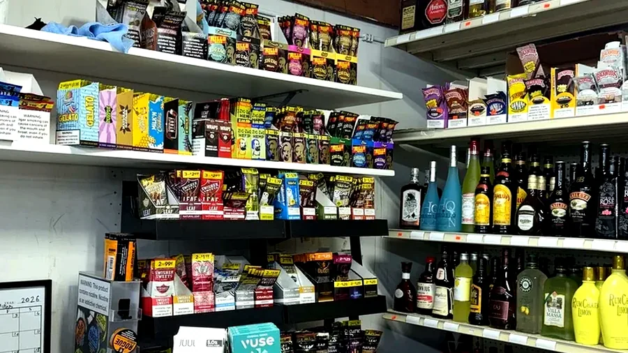 Tobacco shelf inside Harrison Liquor