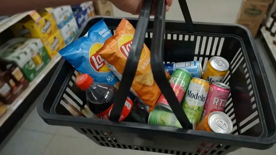 Basket with drinks and snacks inside Harrison Liquor